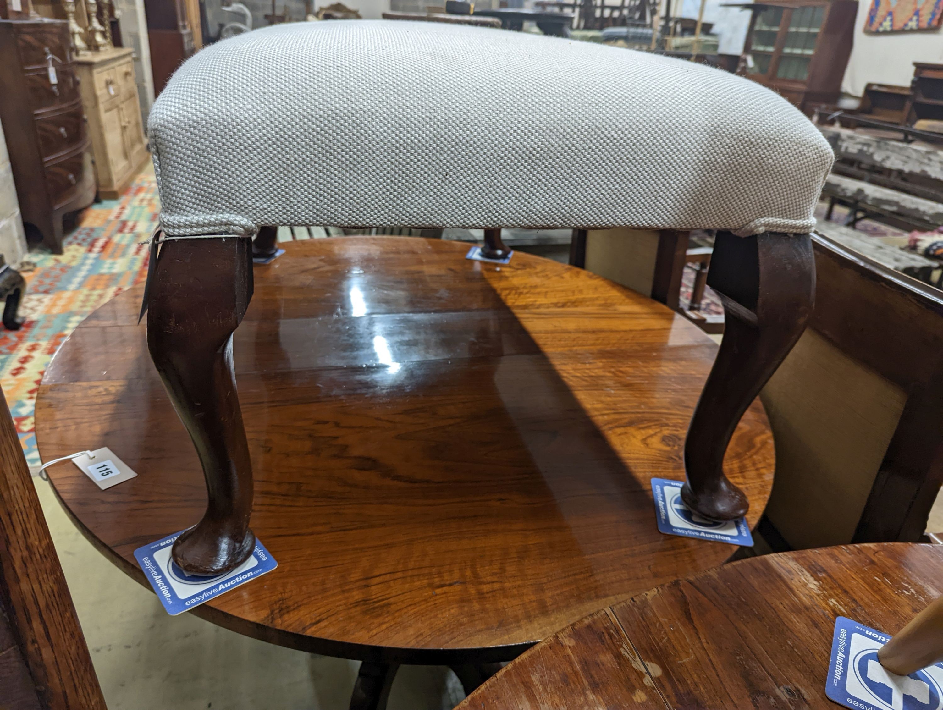 An early 20th century rectangular upholstered dressing stool, length 94cm, depth 54cm, height 42cm